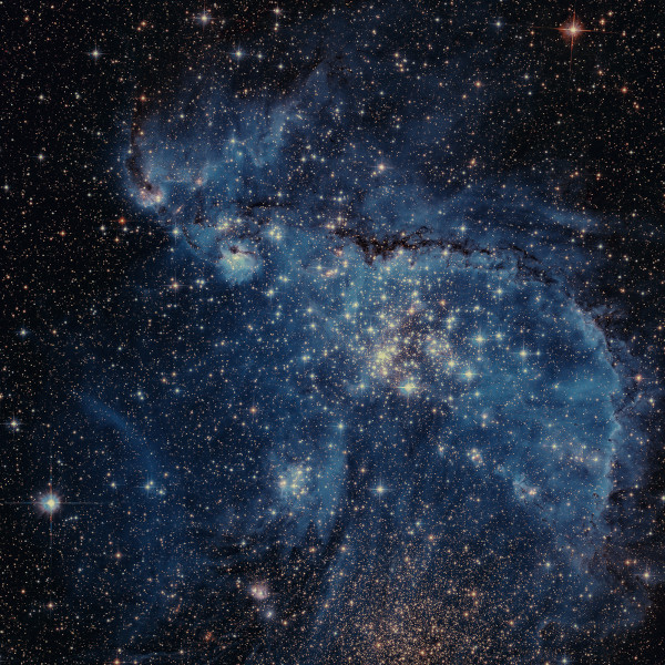 Pequena Nuvem de Magalhães, uma galáxia anã do tipo irregular.